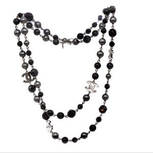 Chanel black pearl necklace.